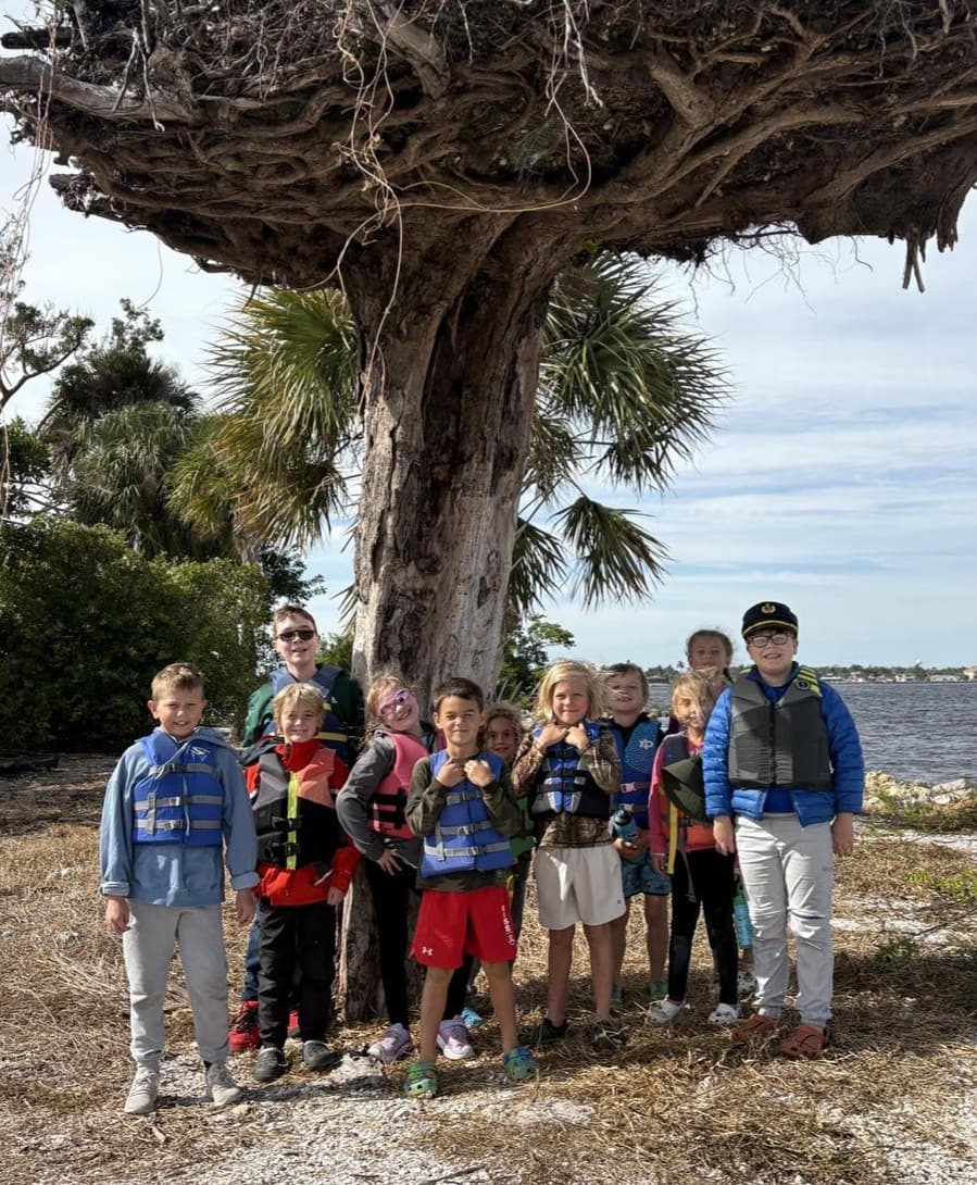Homeschool program students exploring on the water
