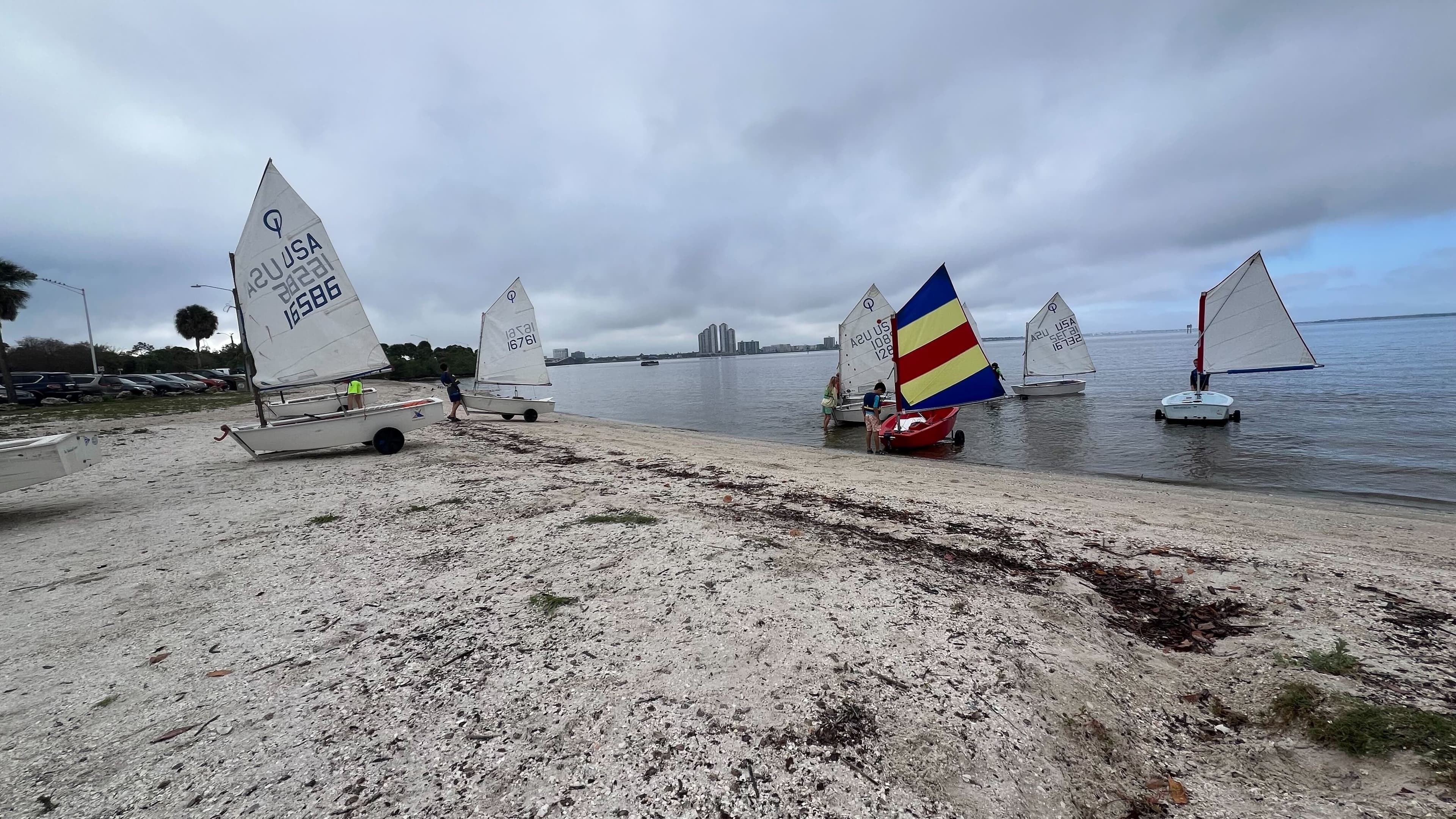 Panoramic view of sailing fleet along the shore